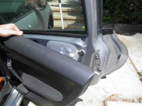 removing a car door panel
